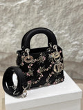 Lady Dior small black silk embroidery bag with silver hardware