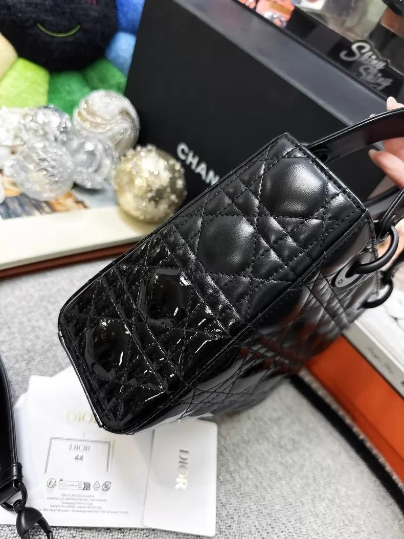 Dior Lady Dior bag in matte black with calfskin and patent leather accents