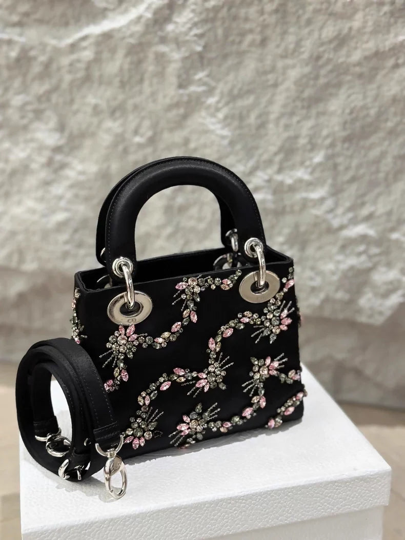 Lady Dior small black silk embroidery bag with silver hardware